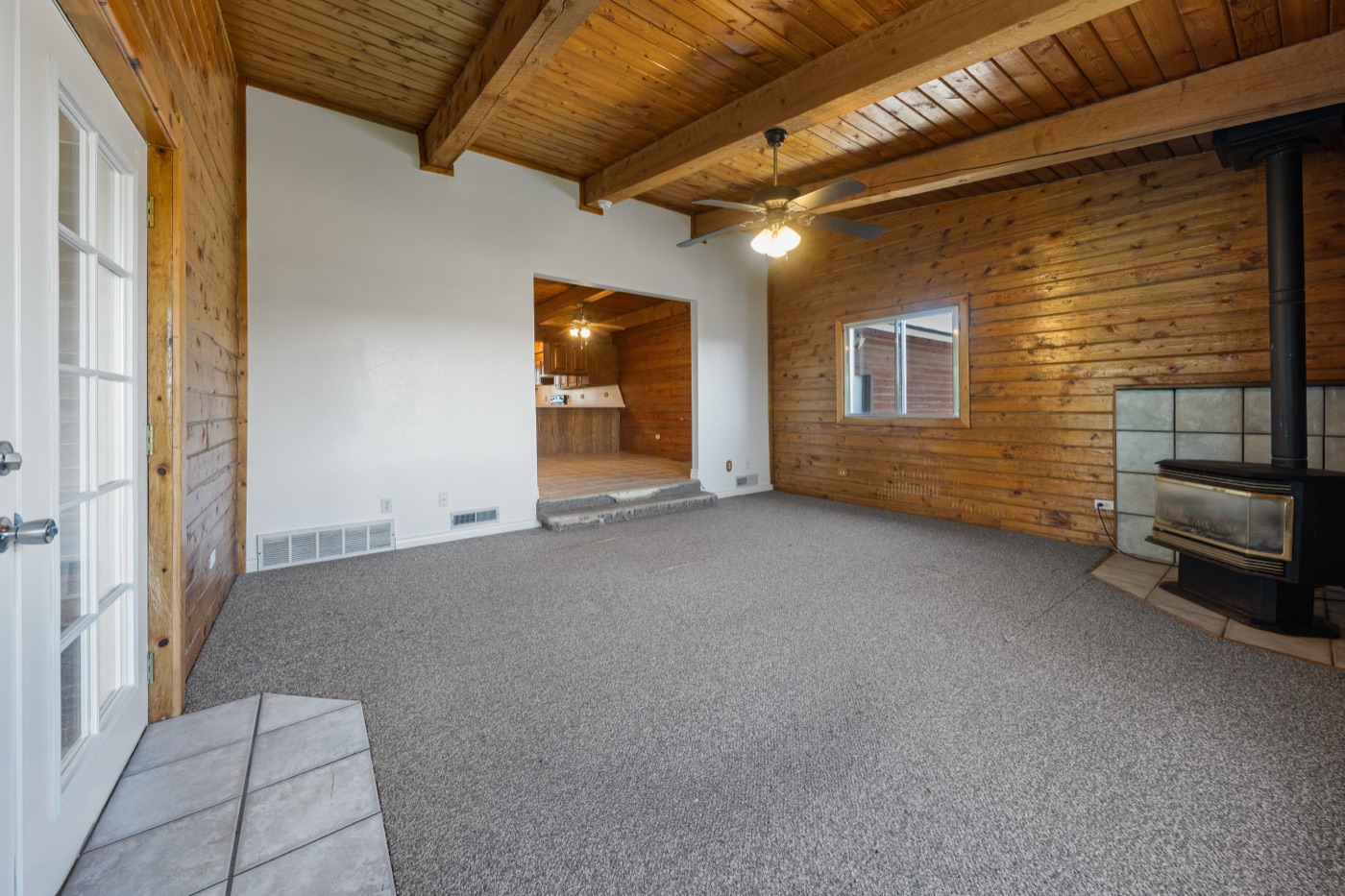 Family room with wood stove and tile hearth